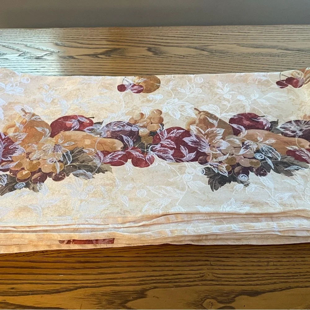 Fruit design tablecloth 56” x 100” in like new condition.